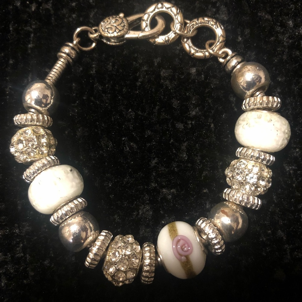 Brand new. Never worn Silver Charm Bracelet
